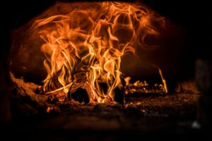 What Material Behind a Wood-Fired Hearth is Best?
